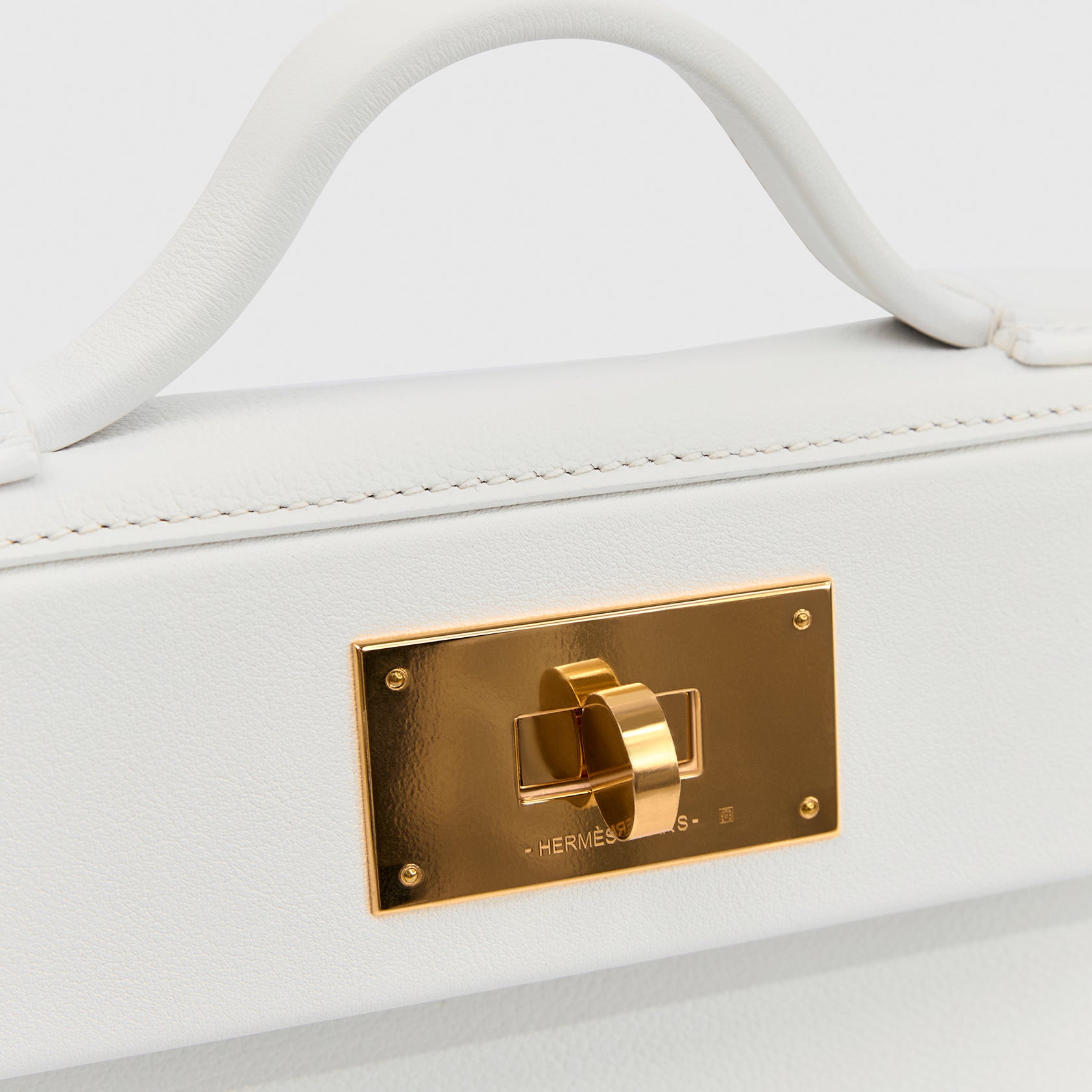 Hermès 24/24 Mini Swift New White/New White Gold Hardware