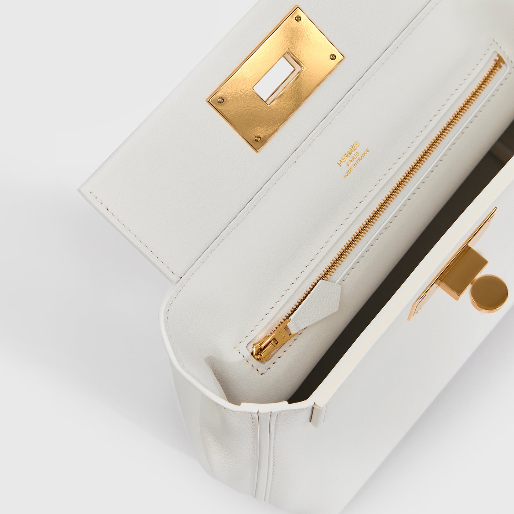 Hermès 24/24 Mini Swift New White/New White Gold Hardware