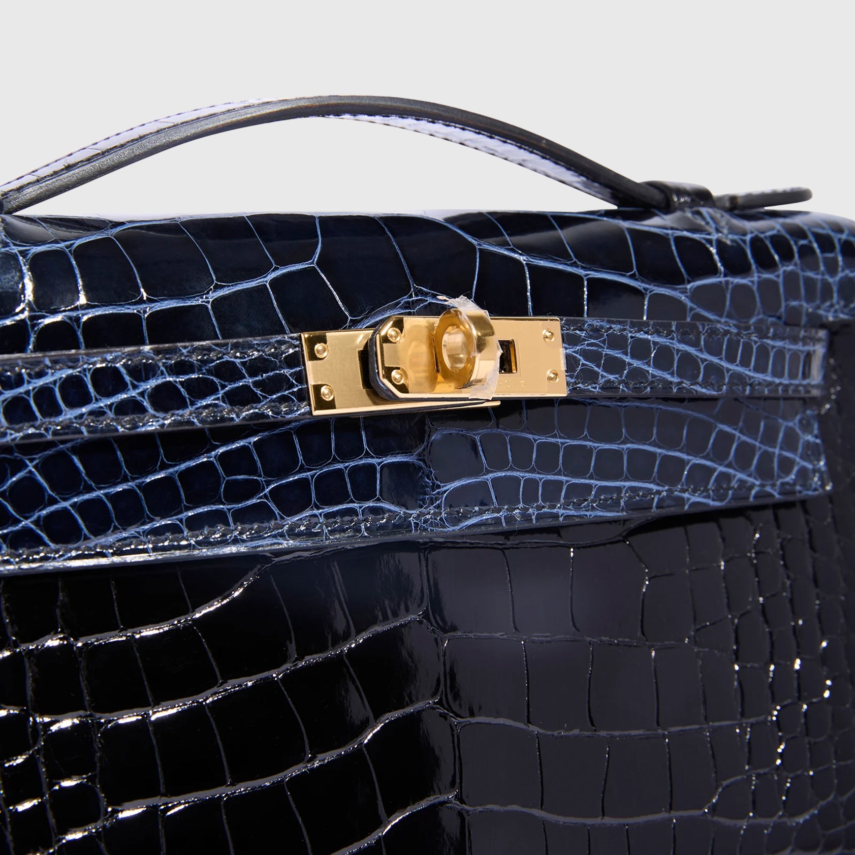 Hermès Kelly Pochette Mini Alligator Black/Blue Marine Gold Hardware Shiny