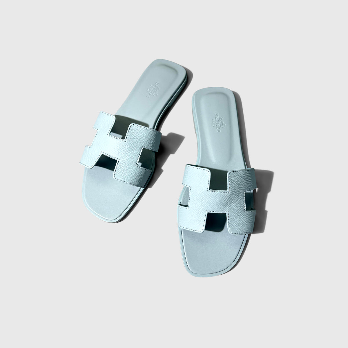 Hermès Oran Sandals Blue Brume