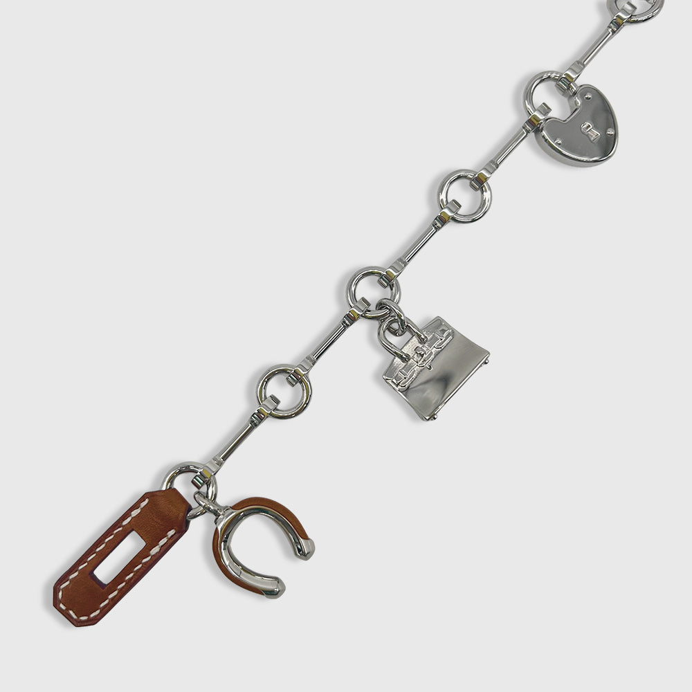 Hermès Bijou de Sac Charm Metallic, Calfskin Fauve / Rouge de Coeur